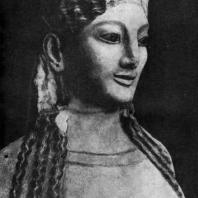 Девушка в пеплосе. Фрагмент. Мрамор. 540—530 гг. до н. э. Афины. Музей Акрополя