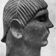 Голова с погребальной урны из Кьюзи. Начало 6 в. до н. э. Глина. Кьюзи. Музей
